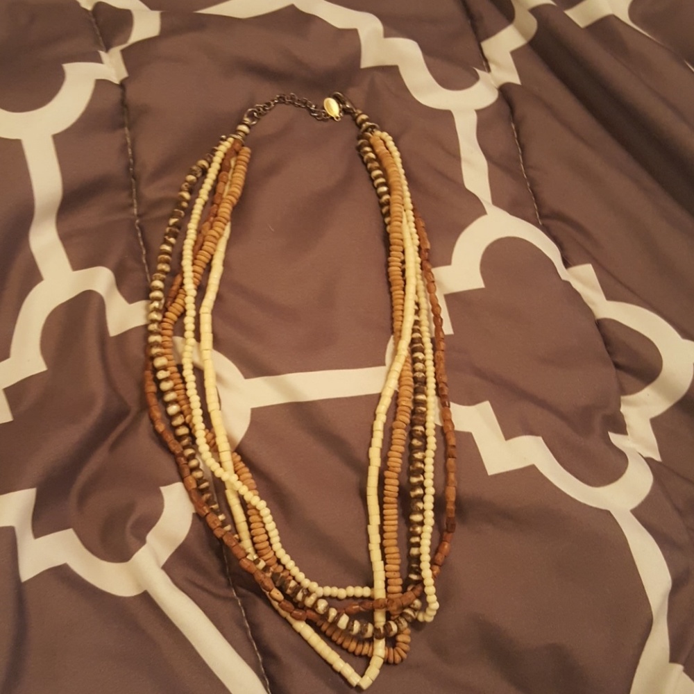 5 different strands of wooden beads